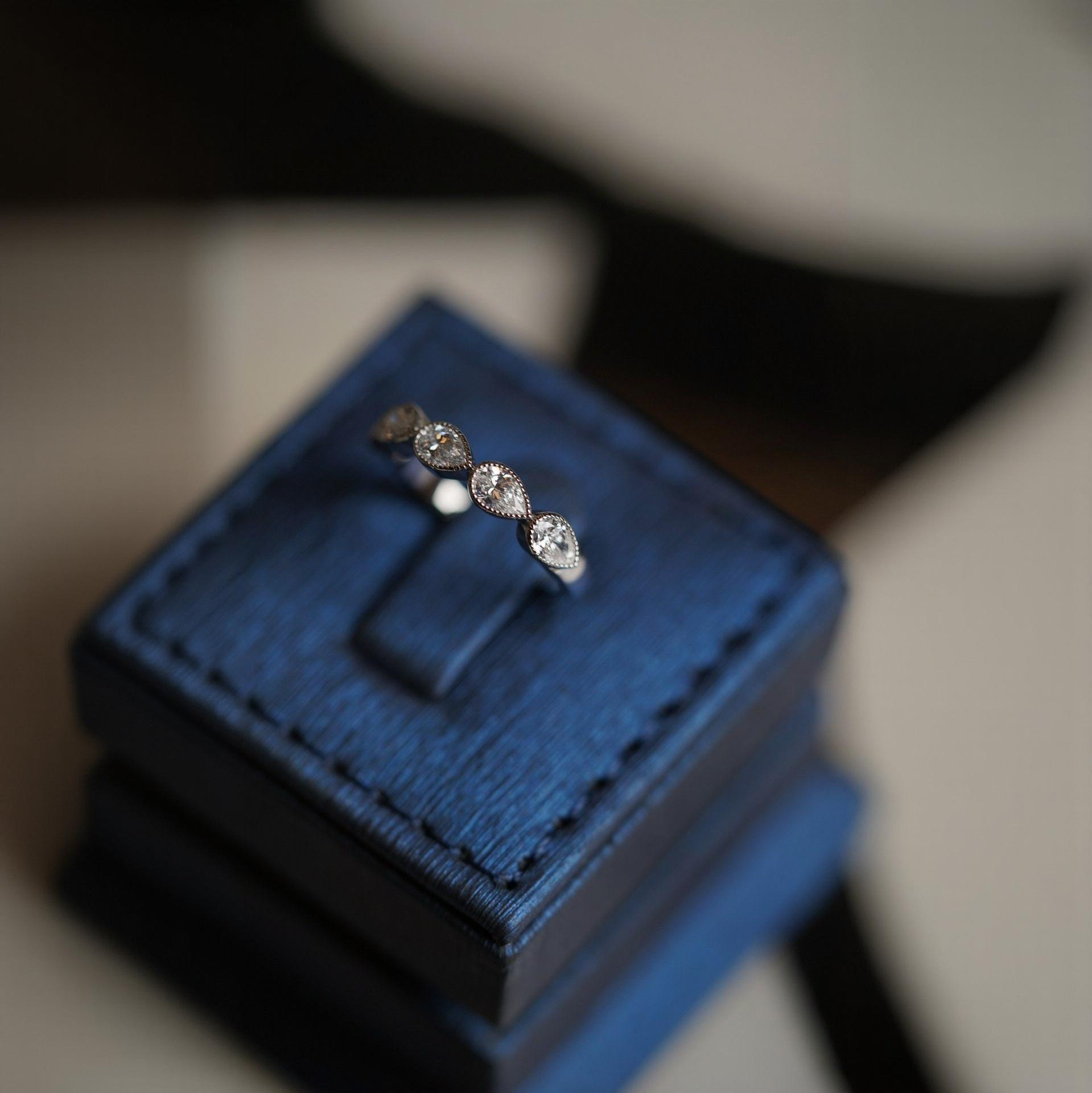 Signature Ring with Pear Diamonds